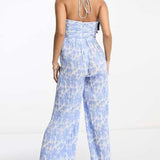 Bardot Hattia Cut Out Jumpsuit In Blue Floral – jumpsuits & playsuits by Bardot, available to rent from Hirestreet