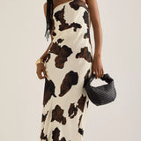 Anthropologie Cow Print Bandeau Slip Dress – dresses by Anthropologie, available to rent from Hirestreet