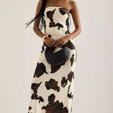 Anthropologie Cow Print Bandeau Slip Dress – dresses by Anthropologie, available to rent from Hirestreet