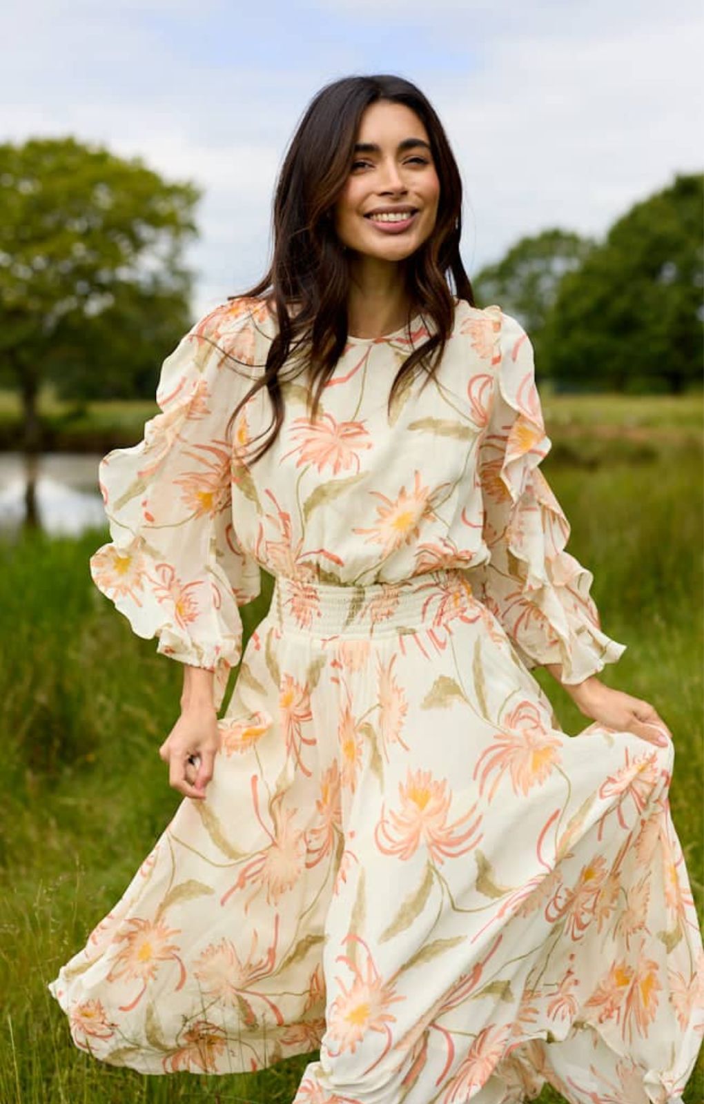 Lily and Lionel Mia Ruffle Sleeve Moonflower Print Midi Dress In Cream – dresses by Lily and Lionel, available to rent from Hirestreet