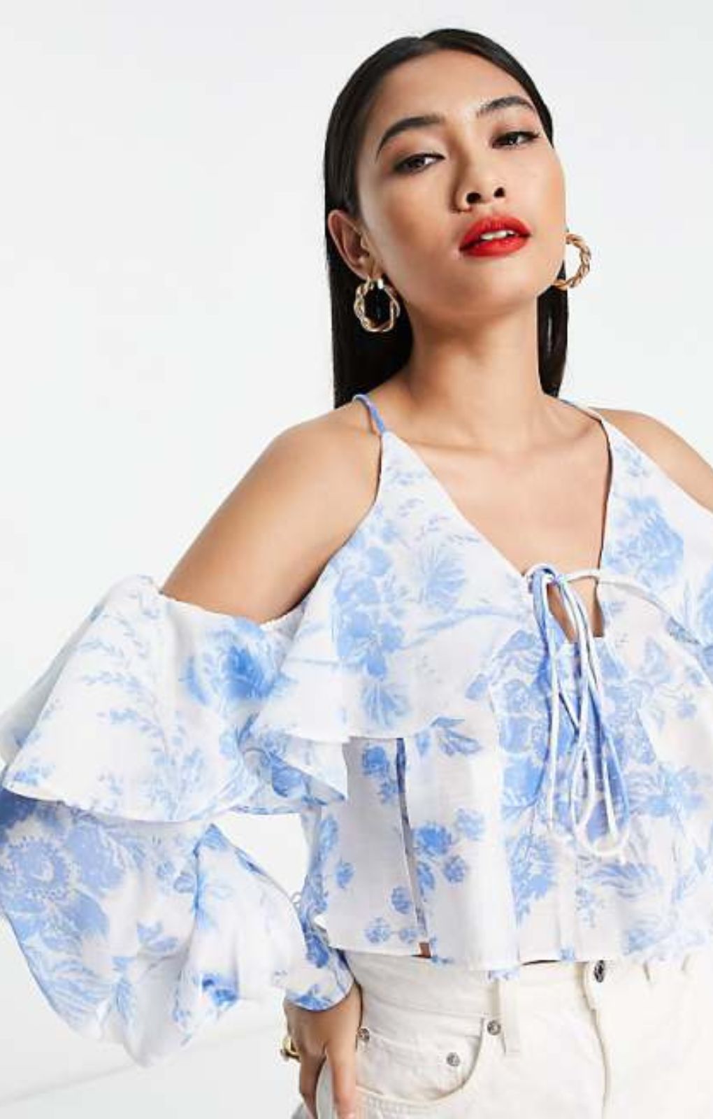 Asos Design Ruffle Blouse With Lace Up Back In Blue Floral – tops by ASOS DESIGN, available to rent from Hirestreet