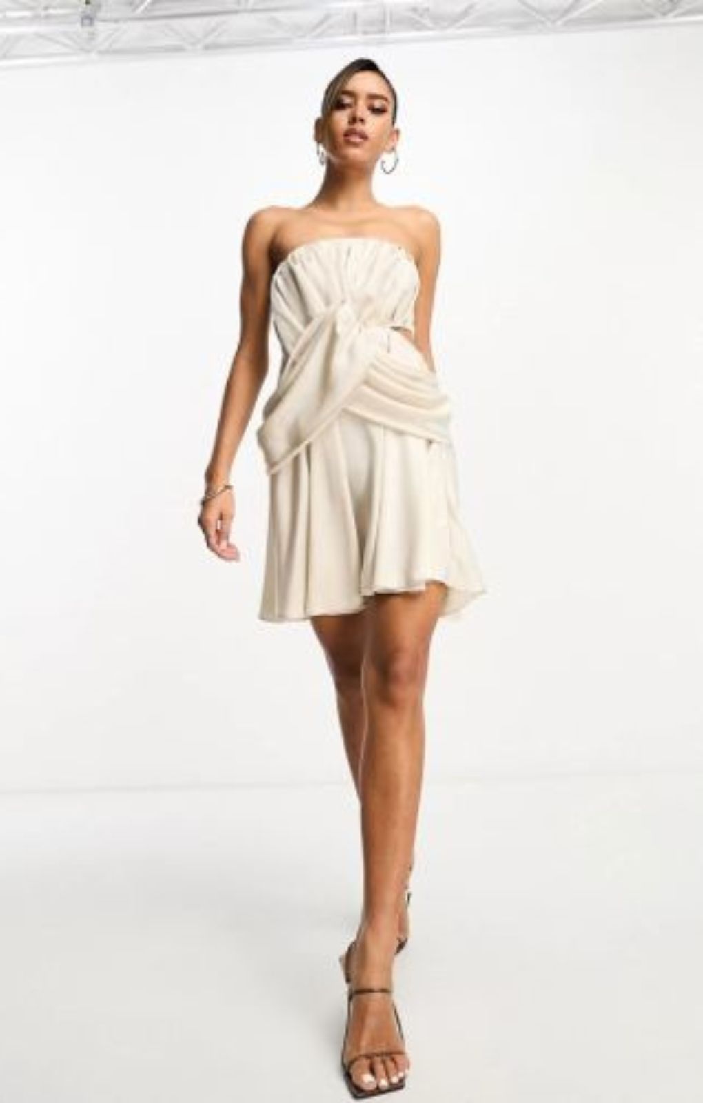 Asos Design Satin Bandeau Drape Twist Mini Dress With Cut Out Detail In Gold – dresses by ASOS DESIGN, available to rent from Hirestreet