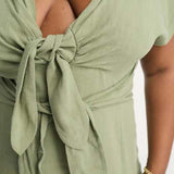Asos Design Curve V-Neck Linen Double Bow Detail Pencil Midi Dress In Khaki – dresses by ASOS Curve, available to rent from Hirestreet