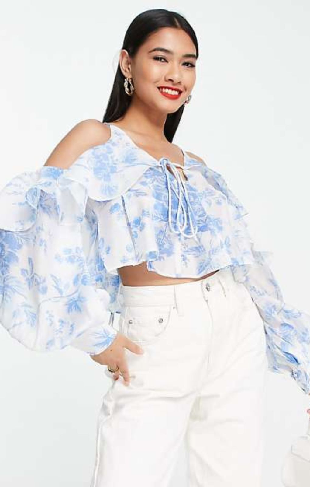 Asos Design Ruffle Blouse With Lace Up Back In Blue Floral – tops by ASOS DESIGN, available to rent from Hirestreet