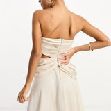 Asos Design Satin Bandeau Drape Twist Mini Dress With Cut Out Detail In Gold – dresses by ASOS DESIGN, available to rent from Hirestreet