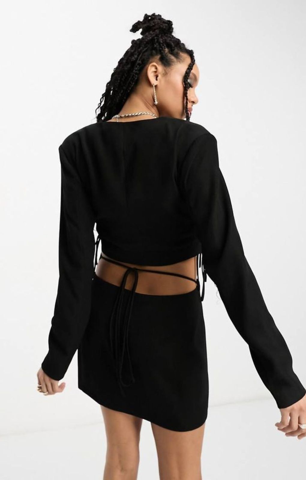 Annorlunda Wrap Around Mini Skirt In Black – skirts by Annorlunda, available to rent from Hirestreet