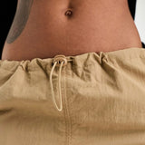 Pieces Exclusive Drawstring Cargo Midi Skirt In Beige – skirts by Pieces, available to rent from Hirestreet