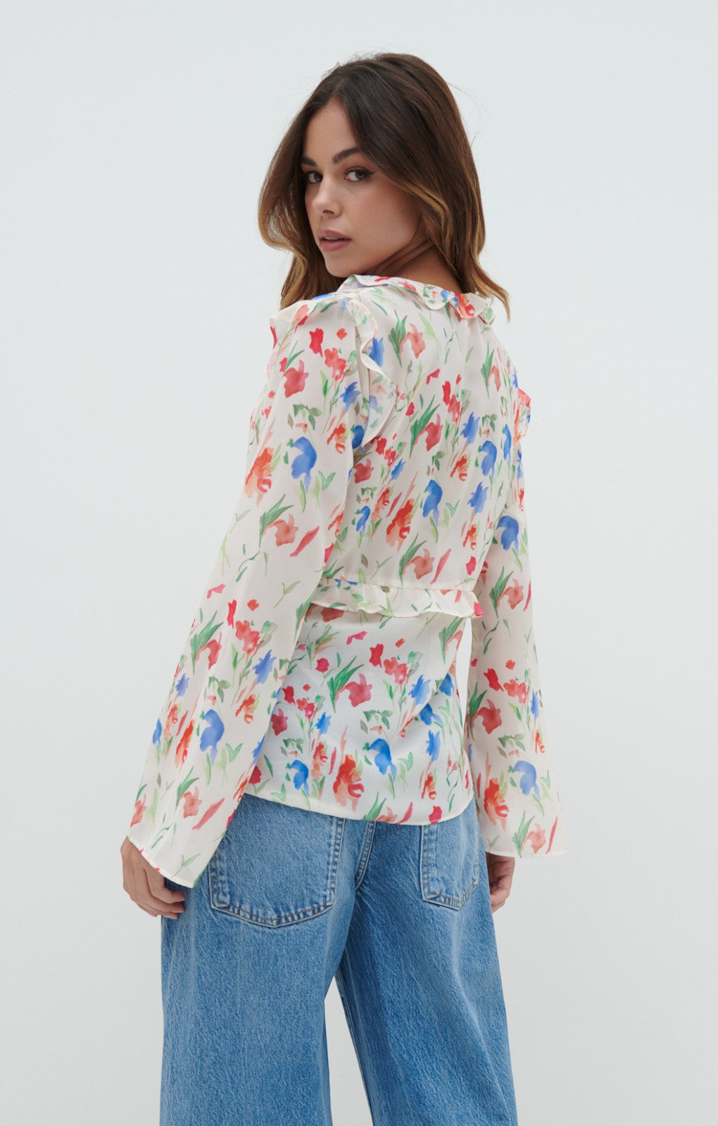 Pretty Lavish Tomlin V Neck Dainty Floral Ruffle Tie Blouse – tops by Pretty Lavish, available to rent from Hirestreet