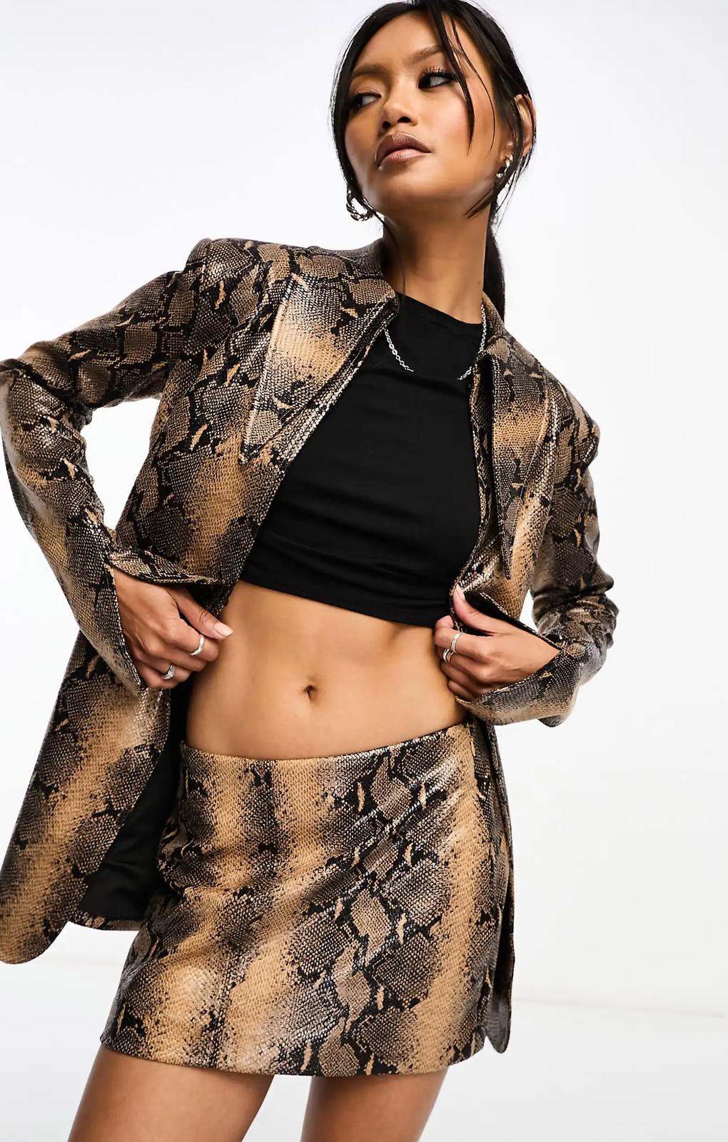 Annorlunda Low Rise Mini Skirt In Shine Brown Snake – skirts by Annorlunda, available to rent from Hirestreet