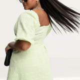 Asos Design Curve Knot Front Mini Dress In Check Dobby In Apple – dresses by ASOS Curve, available to rent from Hirestreet