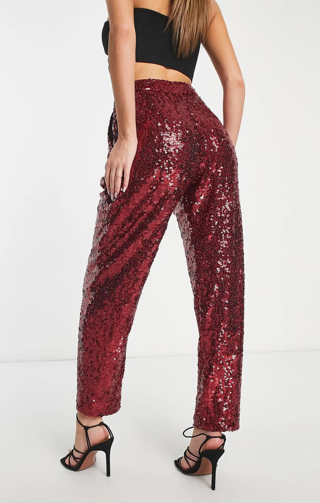 Asos Design Sequin Slouchy Trousers In Red – trousers by ASOS DESIGN, available to rent from Hirestreet
