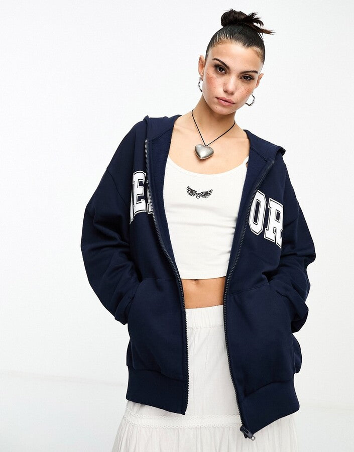 Asos Design Zip Through Hoodie With New York Graphic In Navy – tops by ASOS DESIGN, available to rent from Hirestreet