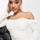 Asyou Long Sleeve Bardot Lace Up Broderie Mini Dress In White – dresses by AsYou, available to rent from Hirestreet