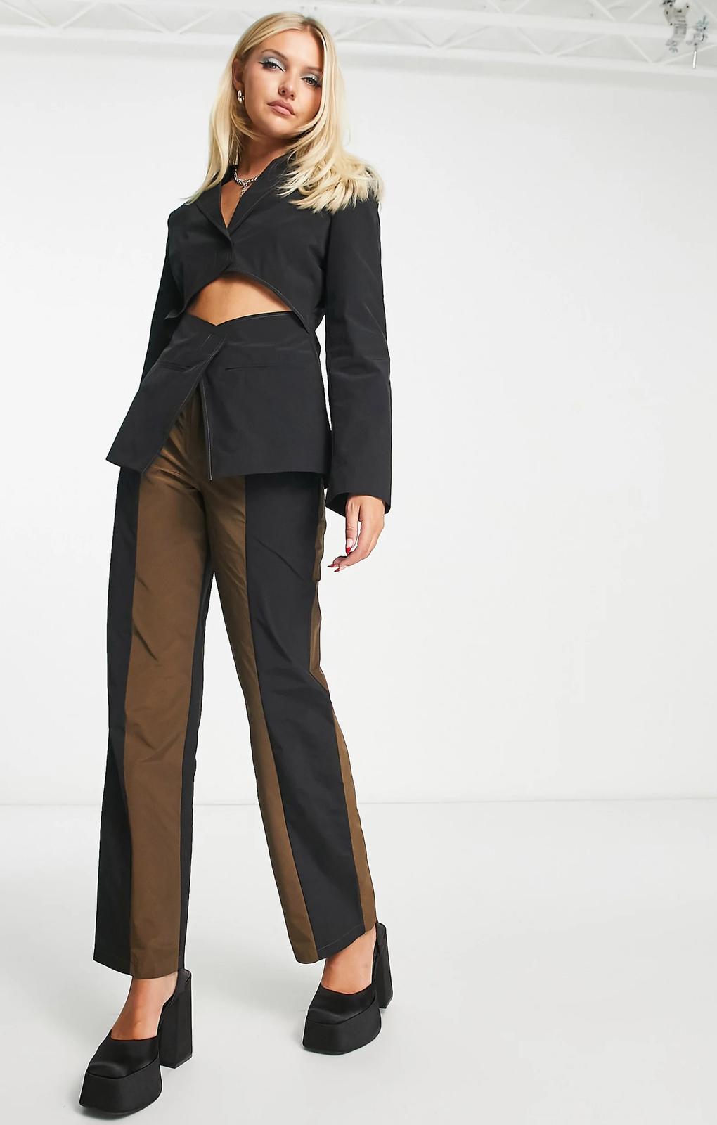 Collusion Straight Spliced Trousers In Black And Brown – trousers by Collusion, available to rent from Hirestreet