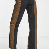 Collusion Straight Spliced Trousers In Black And Brown – trousers by Collusion, available to rent from Hirestreet