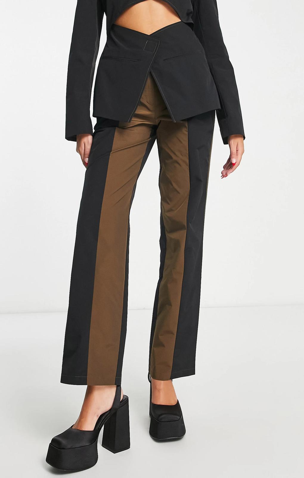 Collusion Straight Spliced Trousers In Black And Brown – trousers by Collusion, available to rent from Hirestreet