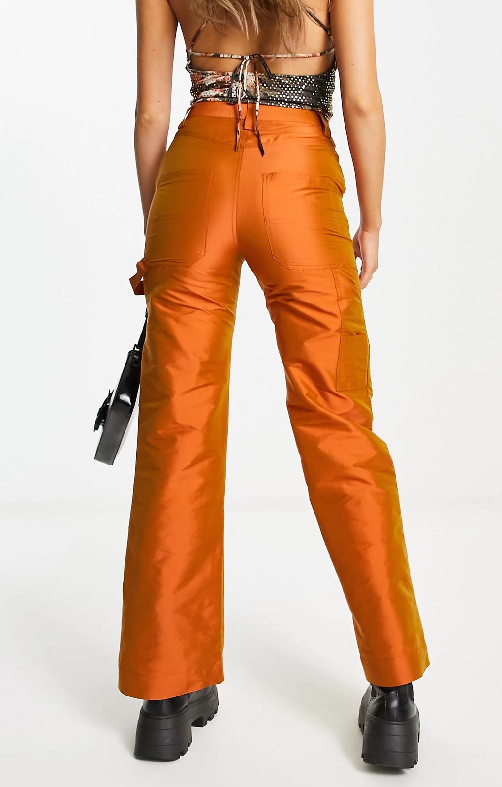 Collusion Taffeta Straight Leg Cargo Trousers In Irridescent Rust – trousers by Collusion, available to rent from Hirestreet