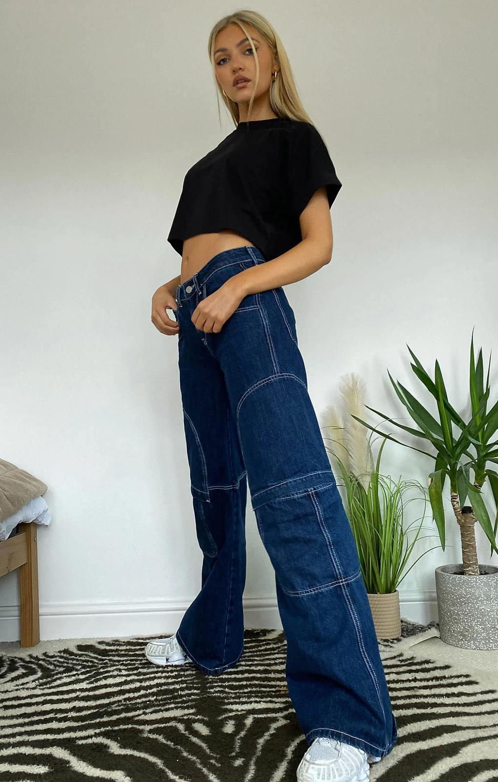 Collusion X008 Exposed Seam Flare Jeans In Indigo – jeans by Collusion, available to rent from Hirestreet