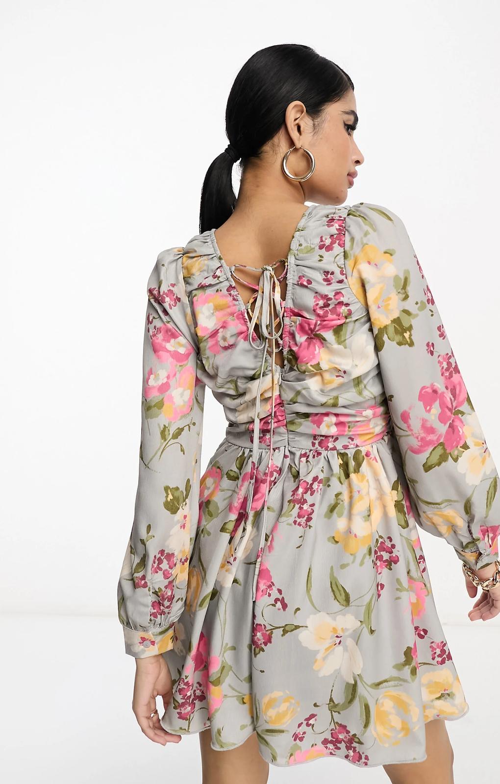 In The Style X Georgia Louise Volume Sleeve Lace-Up Back Flippy Playsuit In Grey Floral – jumpsuits & playsuits by In The Style, available to rent from Hirestreet