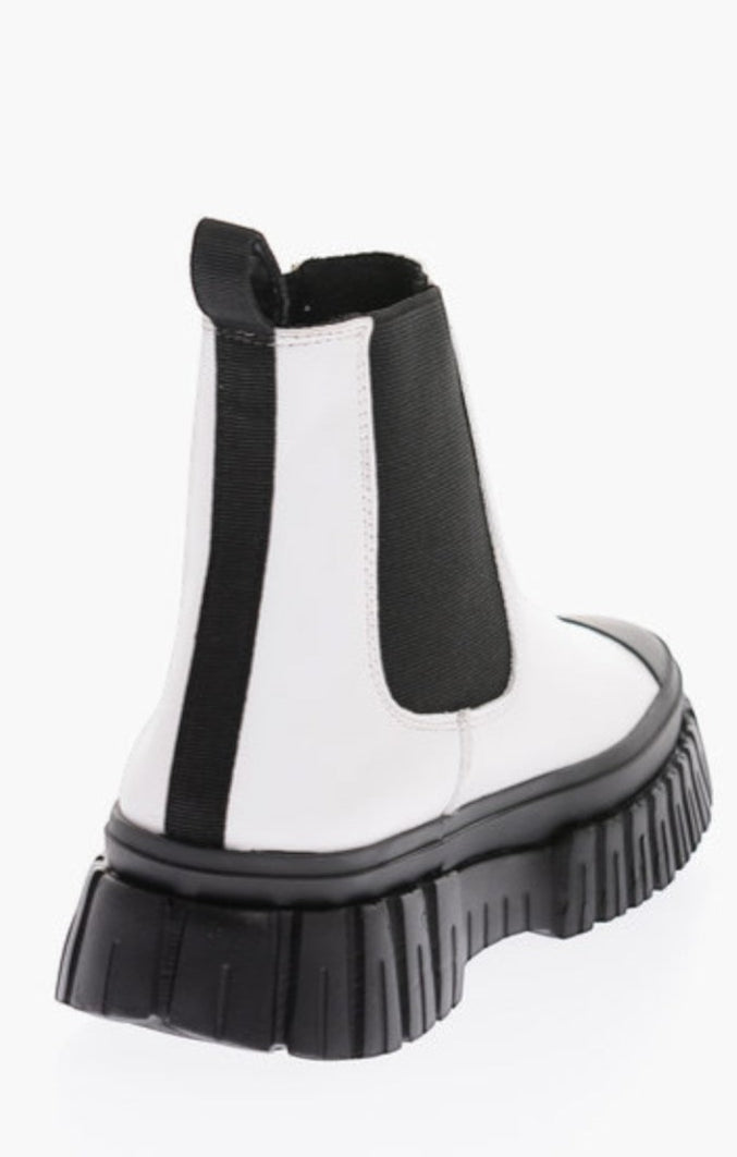 Love Moschino Two Tone Leather Chelsea Boots With Track Sole – shoes by Love Moschino, available to rent from Hirestreet