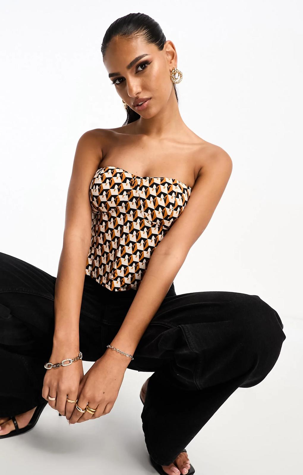 Vila Cupped Corset In Orange Print – tops by Vila, available to rent from Hirestreet