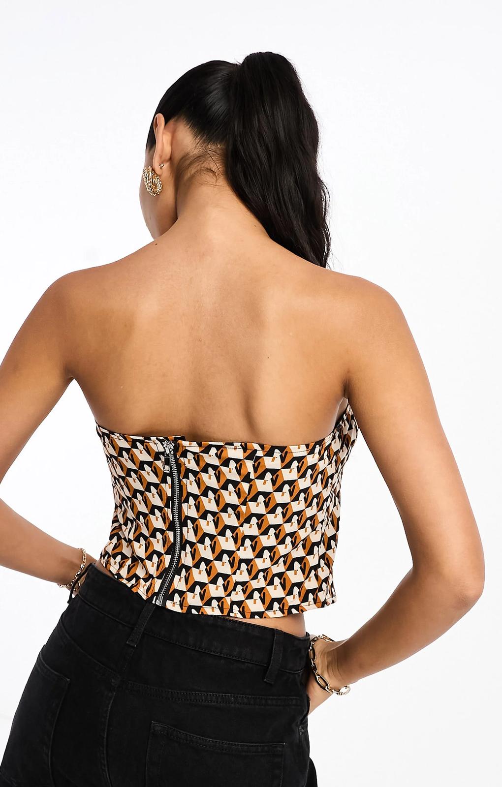 Vila Cupped Corset In Orange Print – tops by Vila, available to rent from Hirestreet