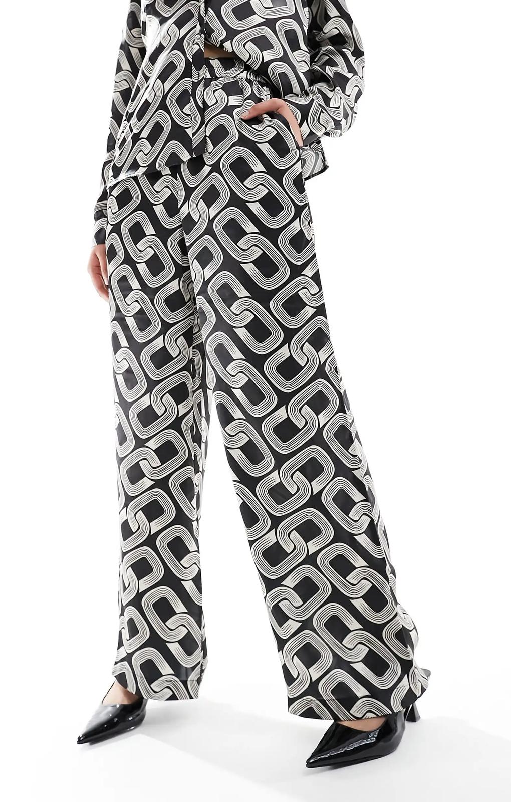 Y.A.S Satin Trouser In Mono Print – trousers by YAS, available to rent from Hirestreet