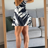 Asos Design Satin Bandeau Asymetric Hem Mini Dress With Ruched Bodice Detail In Mono Abstract Print