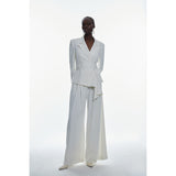 Karen Millen Pleat Detail Wide Leg Trouser – trousers by Karen Millen, available to rent from Hirestreet