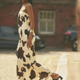 Anthropologie Cow Print Bandeau Slip Dress – dresses by Anthropologie, available to rent from Hirestreet