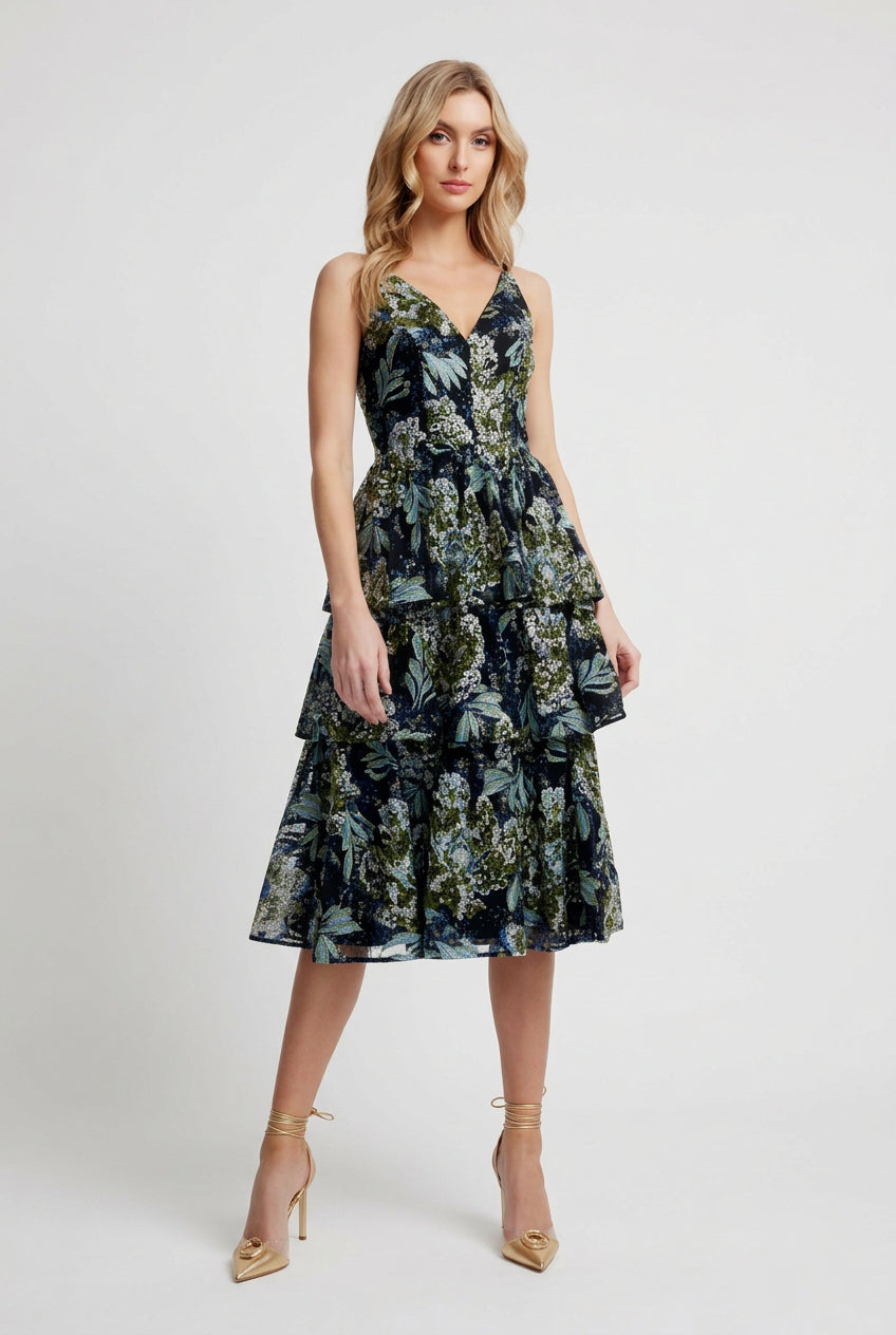 Woman wearing a floral dress on a white background