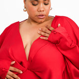 ASOS DESIGN Curve Batwing Satin Mini Dress With Bias Cut Skirt And Tie Back In Red