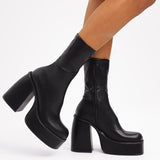 ASOS DESIGN Elated Heeled Chunky Platform Sock Boots In Black