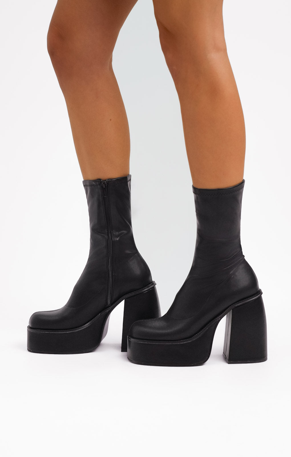 ASOS DESIGN Elated Heeled Chunky Platform Sock Boots In Black