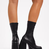 ASOS DESIGN Elated Heeled Chunky Platform Sock Boots In Black