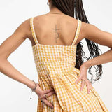 Asos Design Flippy Skater Playsuit In Mustard Gingham