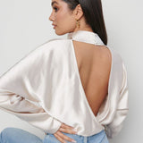 Pretty Lavish Bonnie High Neck Oyster Backless Blouse – tops by Pretty Lavish, available to rent from Hirestreet