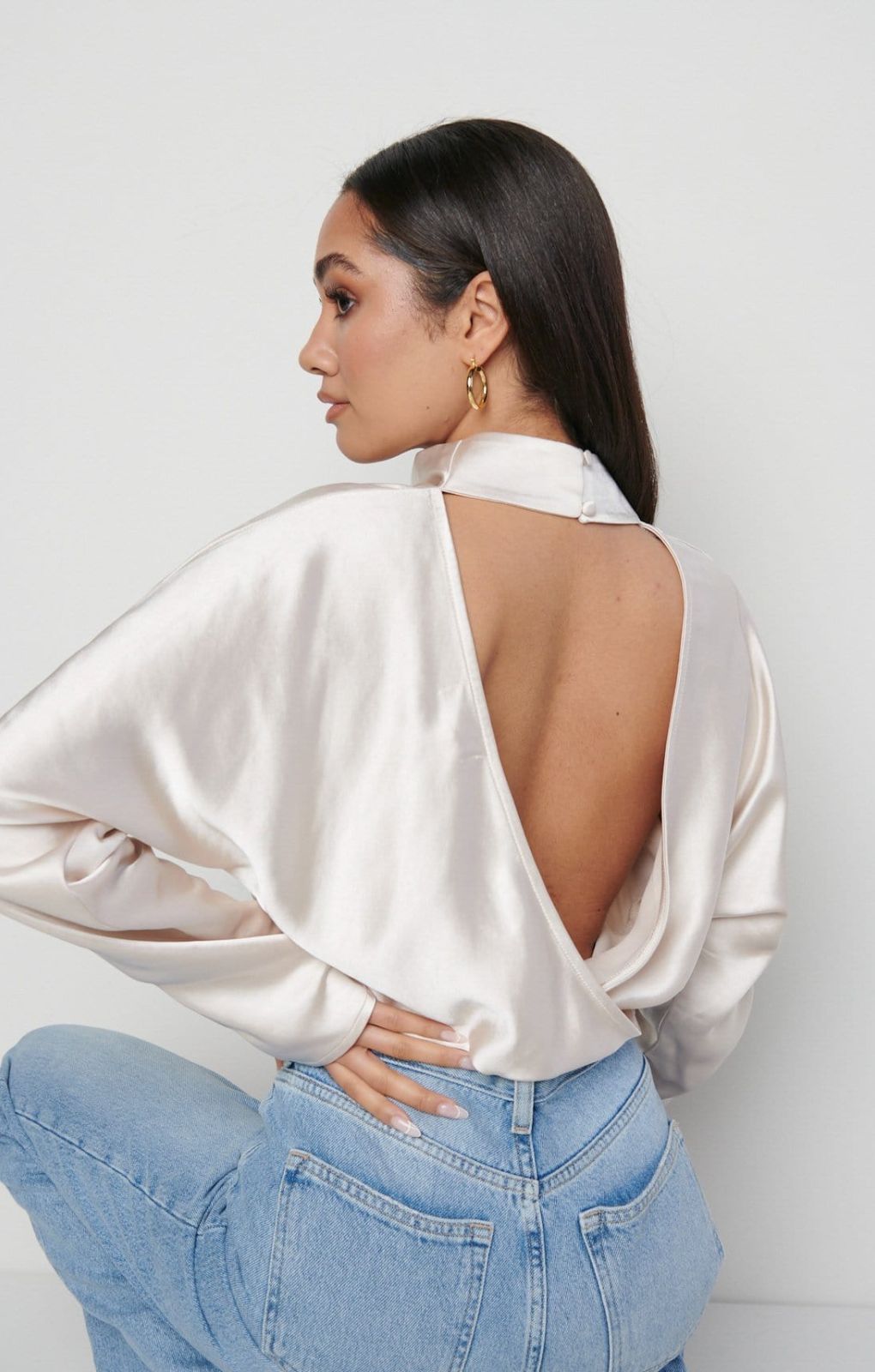 Pretty Lavish Bonnie High Neck Oyster Backless Blouse – tops by Pretty Lavish, available to rent from Hirestreet