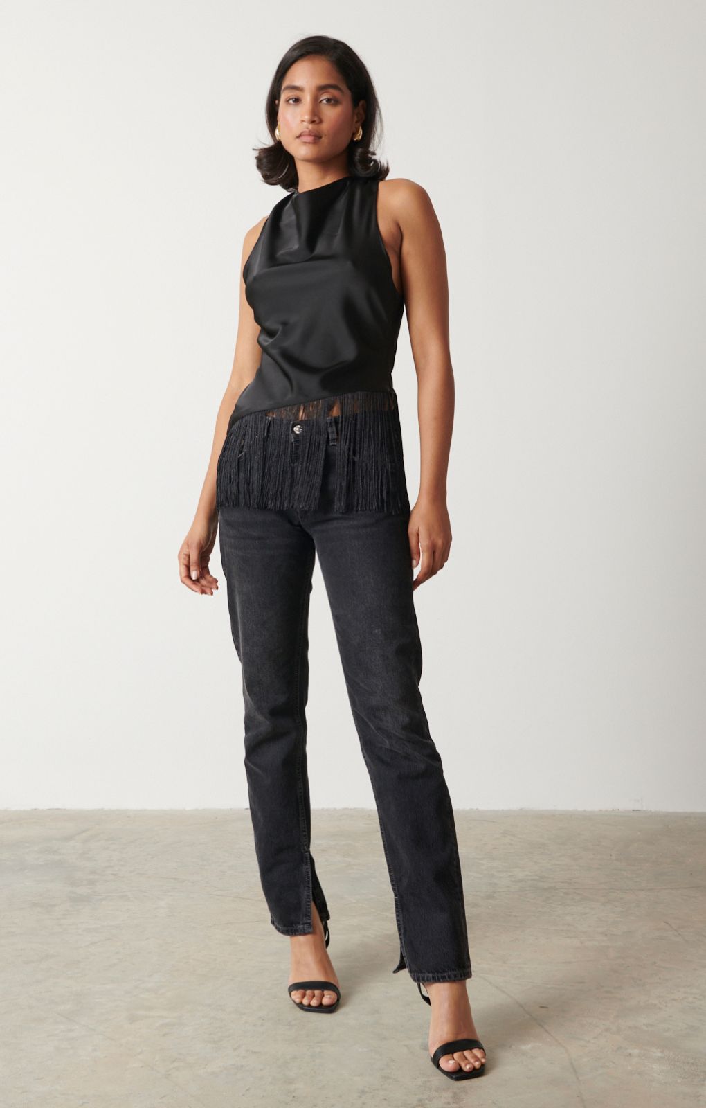 Pretty Lavish Callie Asymmetric Black Fringed Top – tops by Pretty Lavish, available to rent from Hirestreet