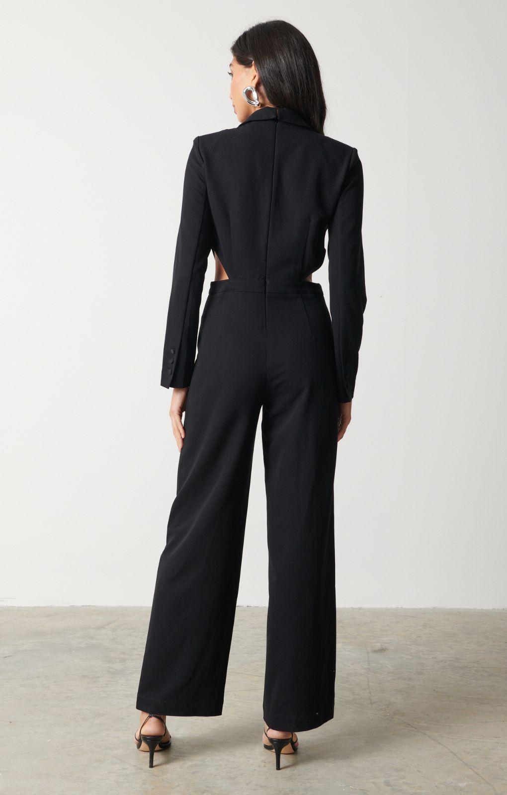 Pretty Lavish Marni Cut Out Black Jumpsuit – jumpsuits & playsuits by Pretty Lavish, available to rent from Hirestreet