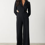 Pretty Lavish Marni Cut Out Black Jumpsuit – jumpsuits & playsuits by Pretty Lavish, available to rent from Hirestreet