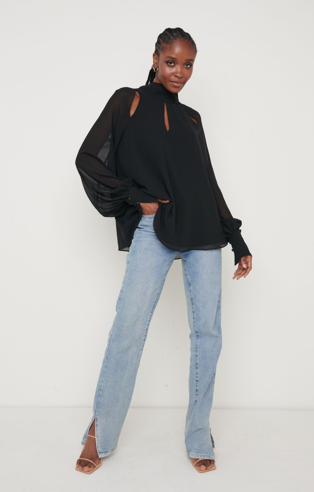 Pretty Lavish Romy Cut Out High Neck Black Blouse – tops by Pretty Lavish, available to rent from Hirestreet