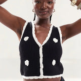 The Frolic Exclusive Knitted Pearl Flower Applique Waistcoat Top in Black and Cream