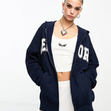 Asos Design Zip Through Hoodie With New York Graphic In Navy
