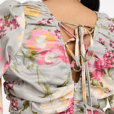 In The Style X Georgia Louise Volume Sleeve Lace-Up Back Flippy Playsuit In Grey Floral
