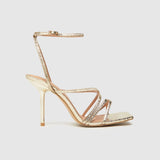 Schuh Sadie Strappy Sandal High Heels in Gold