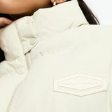 The Couture Club Oversized Pleated Puffer Jacket In Beige With Tie Waist Detail